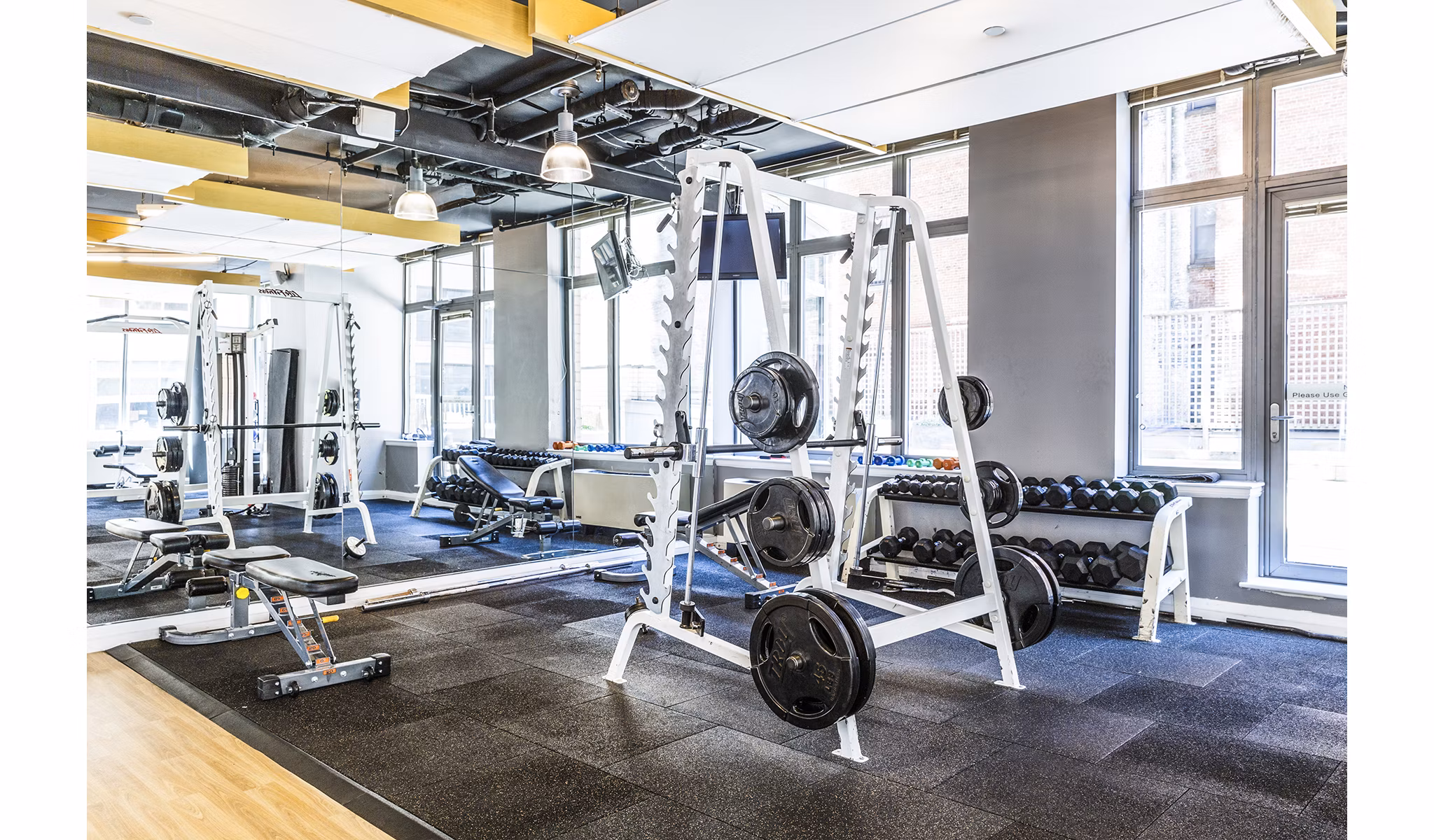 State-of-the-art fitness center at 800 Sixth Apartments with modern equipment and ample workout space for residents