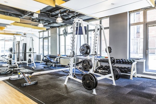 State-of-the-art fitness center at 800 Sixth Apartments with modern equipment and ample workout space for residents