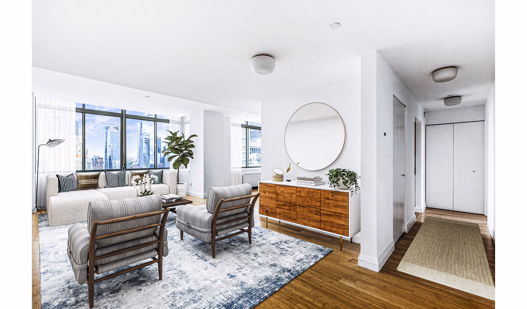 Modern living room with chic furnishings and city views at 800 Sixth Apartments
