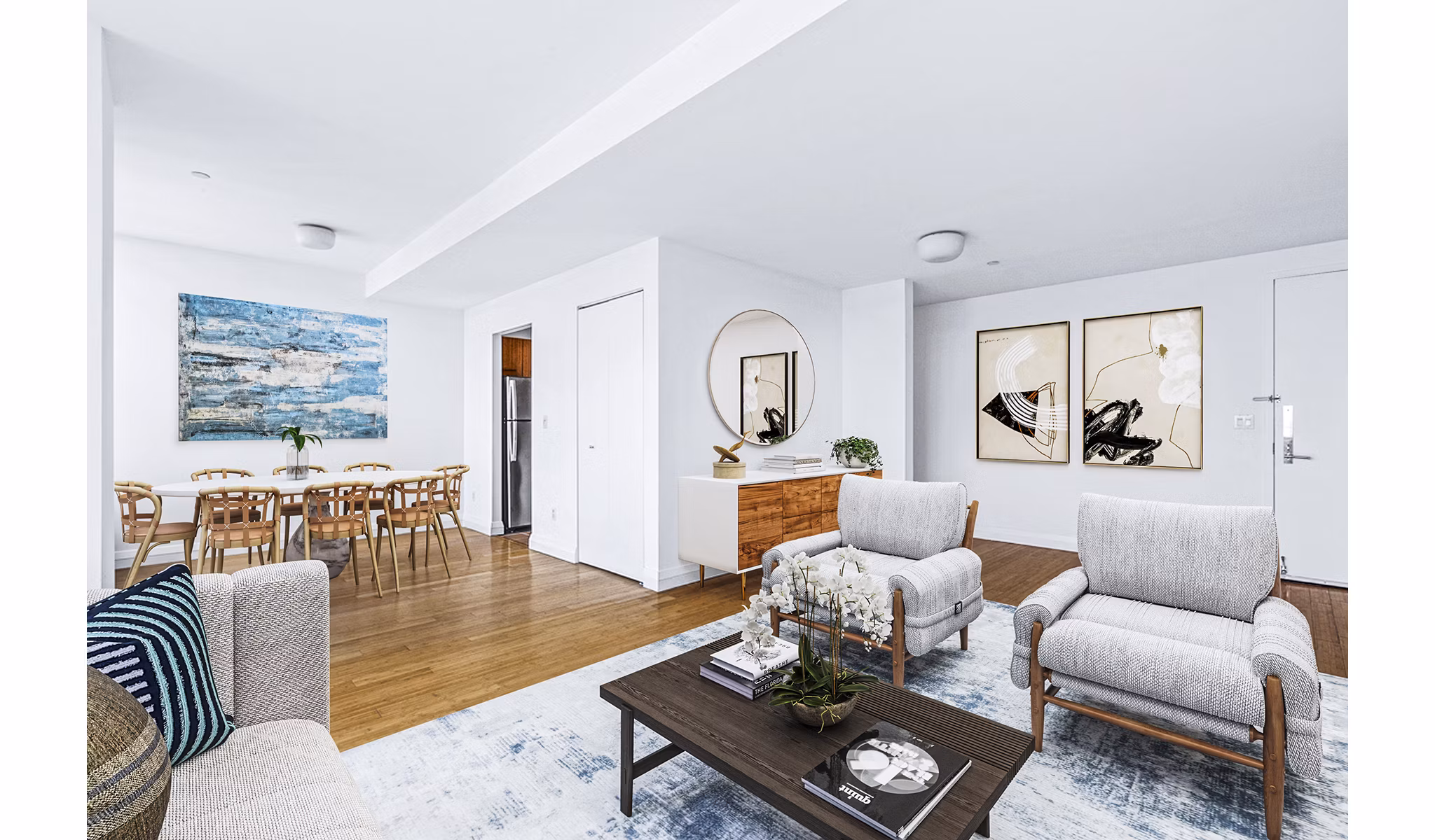 Spacious living room with modern decor at 800 Sixth Apartments, luxury Greystar property in urban setting