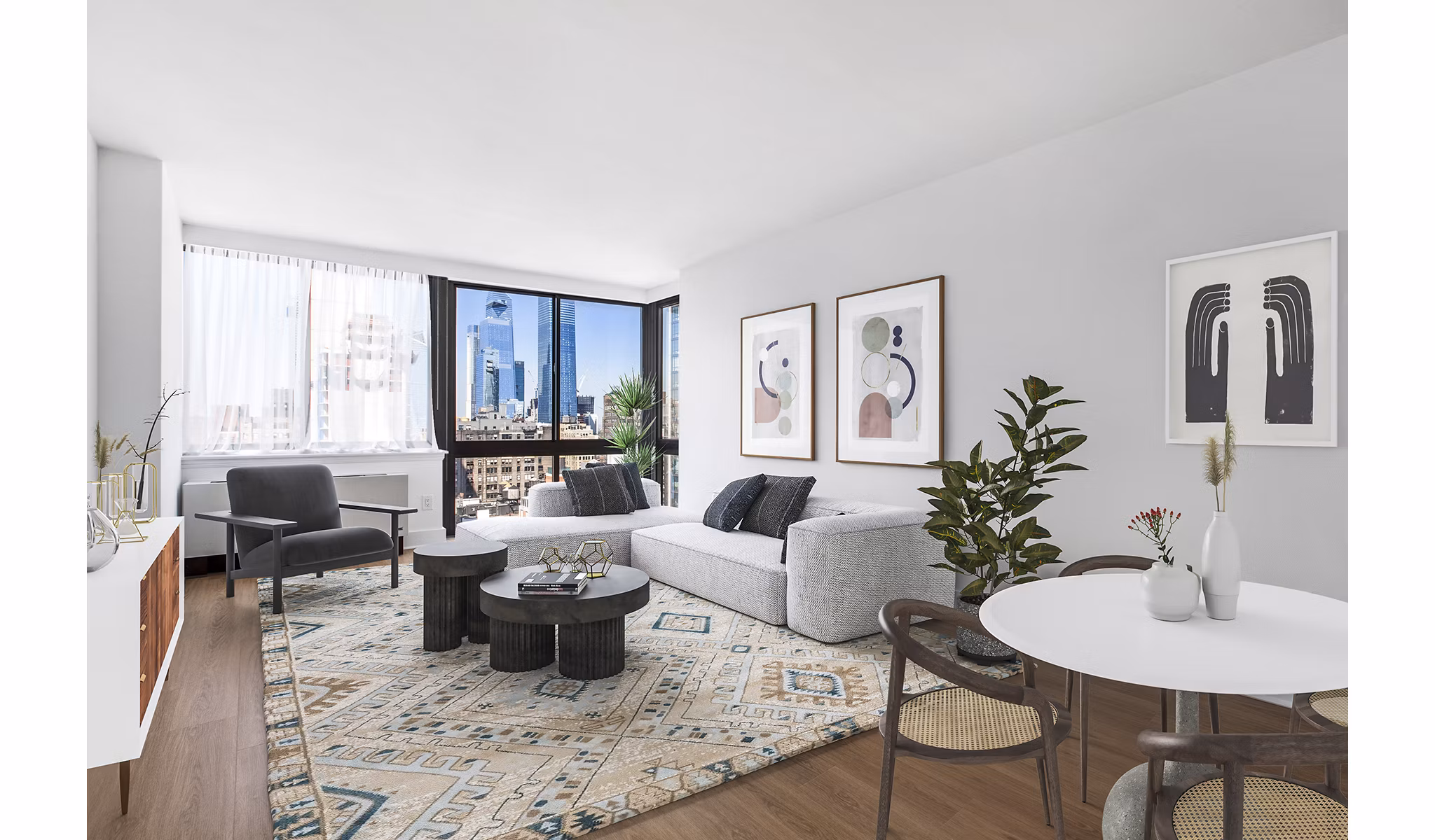 Living room with modern decor and large windows at 800 Sixth Apartments