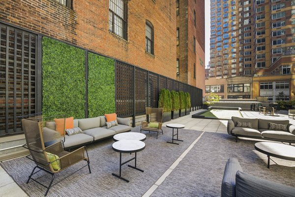 Tranquil courtyard with lush landscaping at 800 Sixth Apartments, downtown living with luxury amenities
