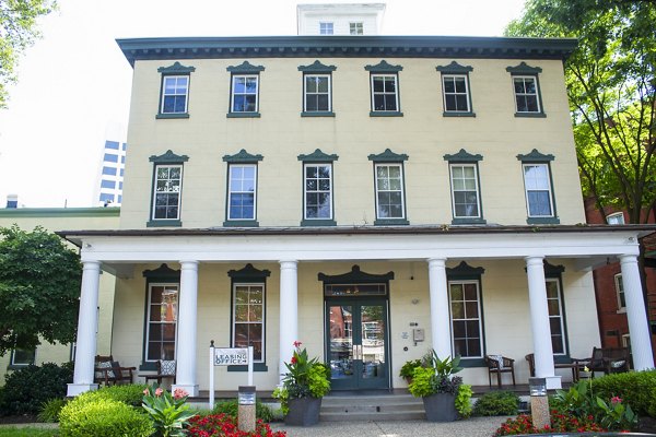 Leasing office with modern decor in Old Quaker Building Apartments, featuring luxury services and amenities for a premium living experience