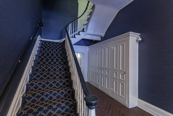 Chic clubhouse with modern decor at Old Quaker Building Apartments, perfect for gatherings and community events