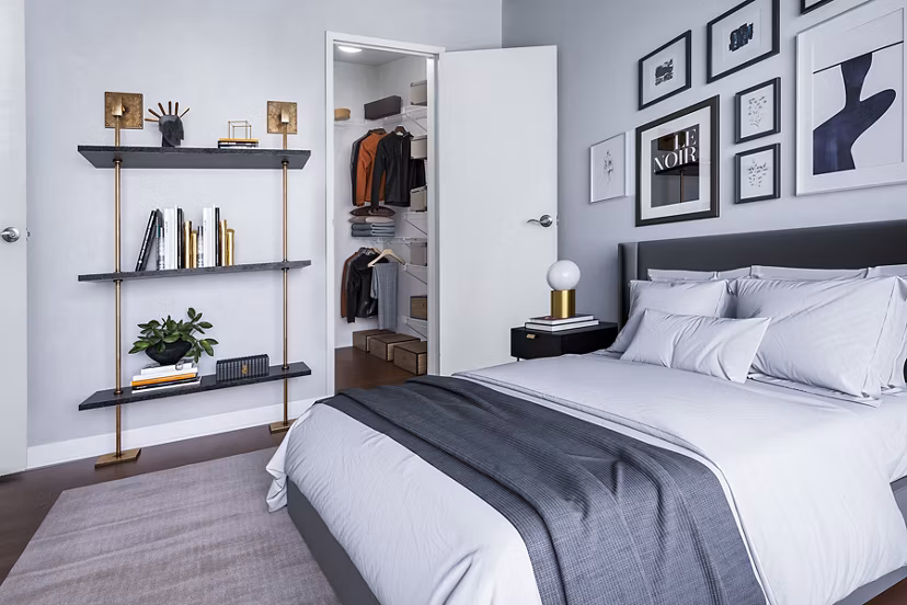 Modern bedroom with stylish decor at Quaker Court at University City Apartments