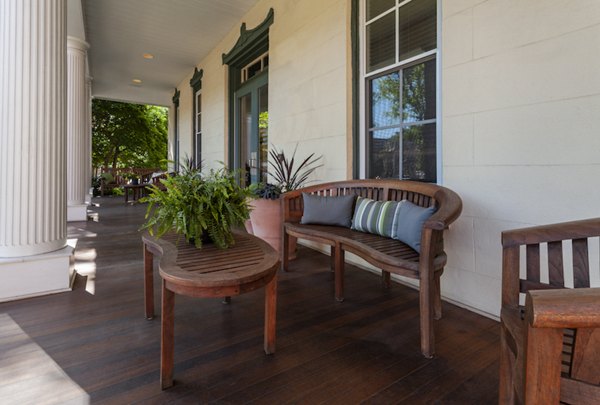 Elegant clubhouse at Old Quaker Building Apartments featuring modern design and ample seating for gatherings