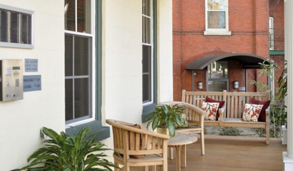 Chic clubhouse with stylish decor at Old Quaker Building Apartments perfect for social gatherings and events