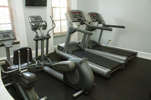 State-of-the-art fitness center with modern equipment at Old Quaker Building Apartments