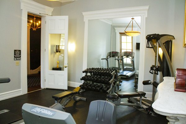 State-of-the-art fitness center at Old Quaker Building Apartments featuring modern equipment and spacious workout areas