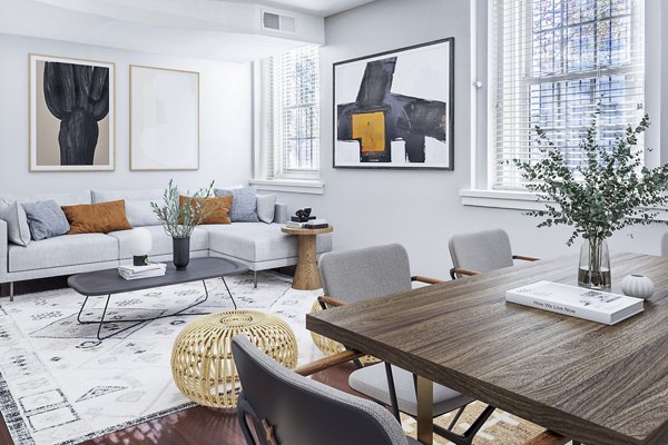 Modern living room with sleek design elements at Quaker Court at University City Apartments