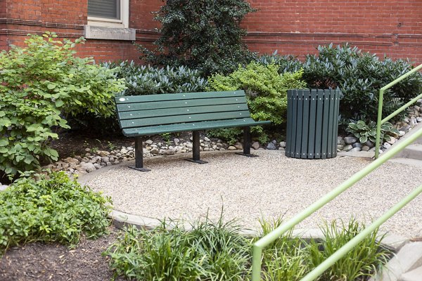 Charming courtyard surrounded by greenery at Old Quaker Building Apartments, a Greystar luxury property in the heart of Philadelphia