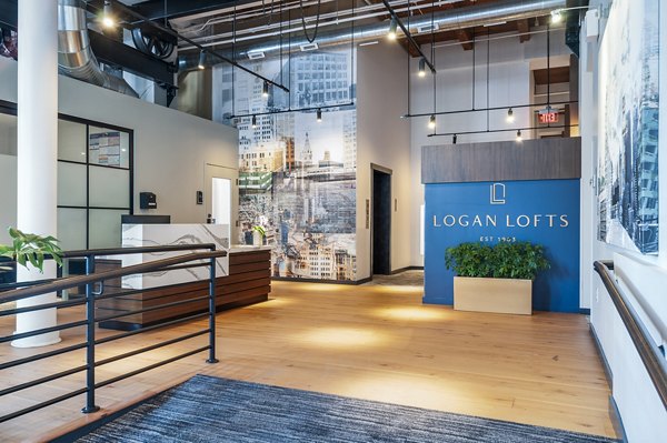 Modern clubhouse lobby with stylish seating at Logan Lofts Apartments, offering luxury spaces for residents to relax and gather