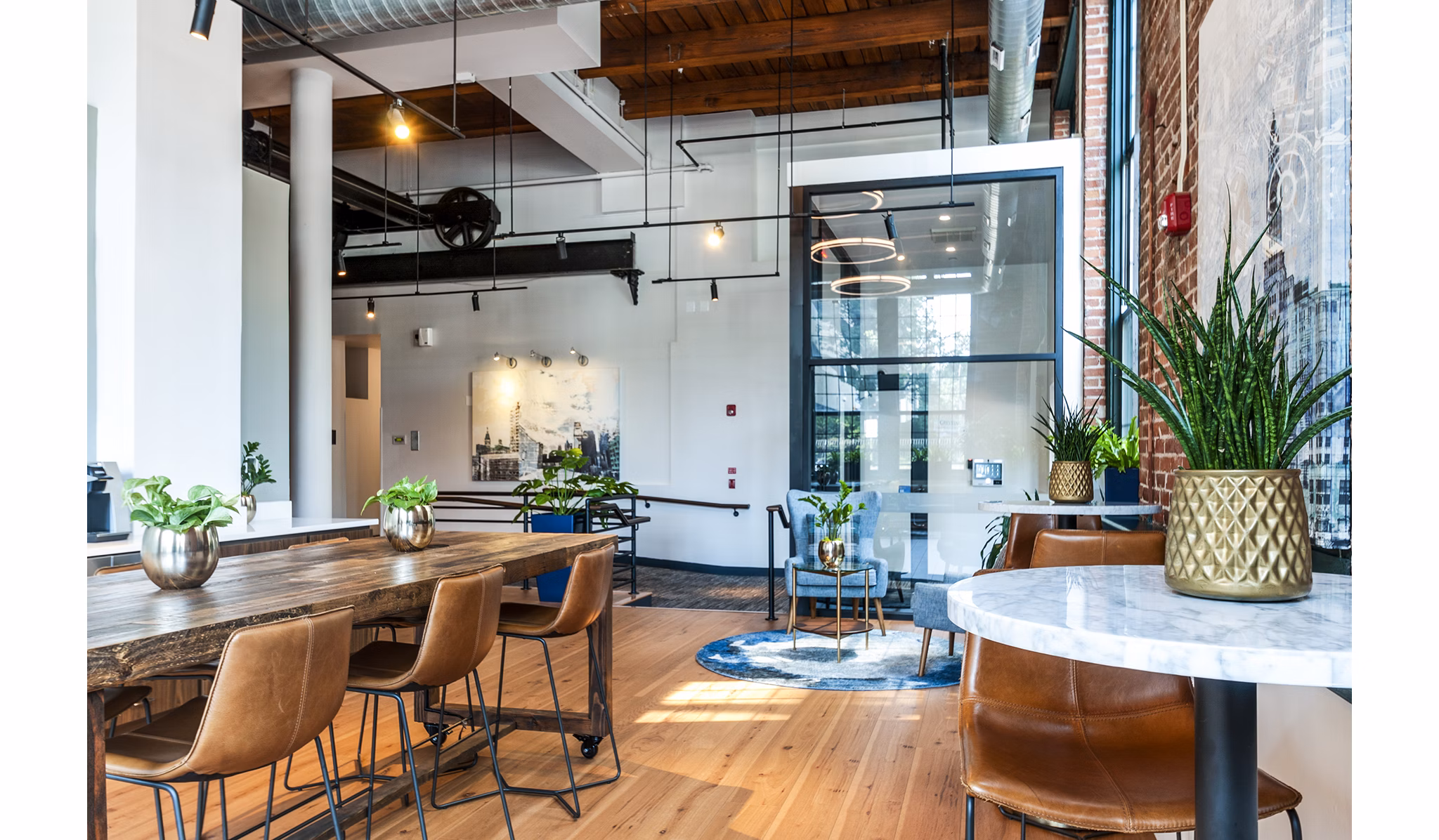 Elegant clubhouse with modern amenities at Logan Lofts Apartments, perfect for luxury living and social gatherings