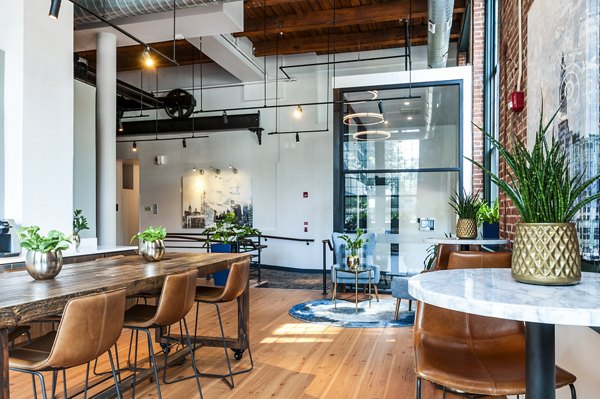 Elegant clubhouse with modern amenities at Logan Lofts Apartments, perfect for luxury living and social gatherings