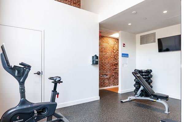 fitness center at Logan Lofts Apartments