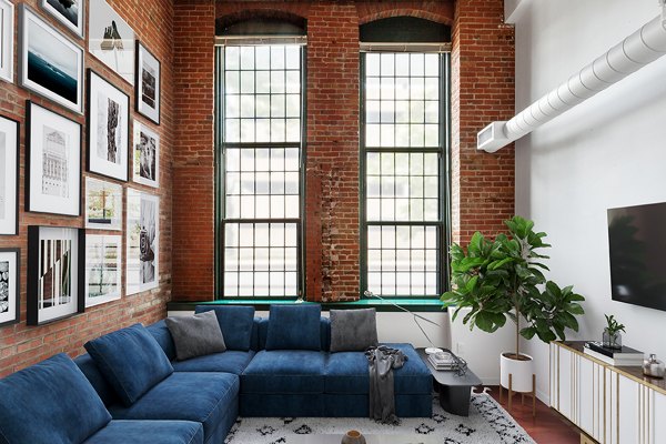 Comfortable living room with stylish decor at Logan Lofts new luxury apartments, ideal for modern living