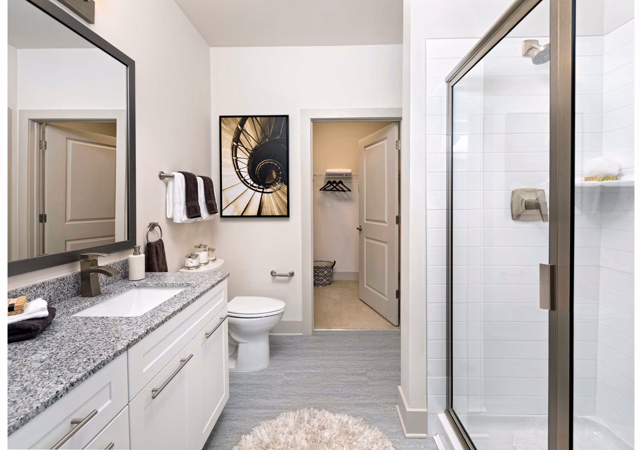 Modern bathroom with sleek fixtures at Avia Apartments featuring a luxurious design