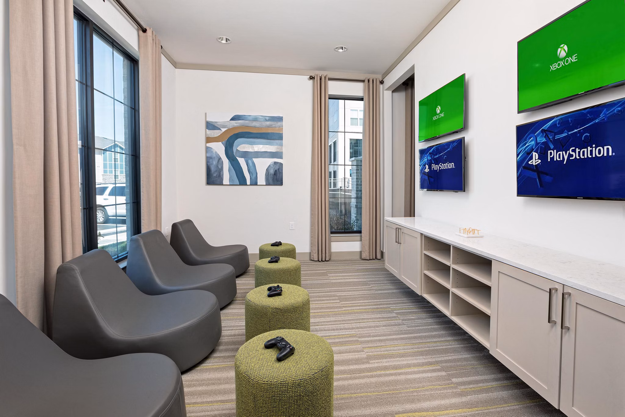 Clubhouse featuring modern decor and ample seating at Avia Apartments, a luxury Greystar property