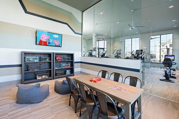 Stylish clubhouse with modern seating at Avia Apartments
