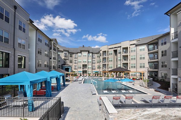 Elegant pool area at Avia Apartments offering luxury leisure facilities