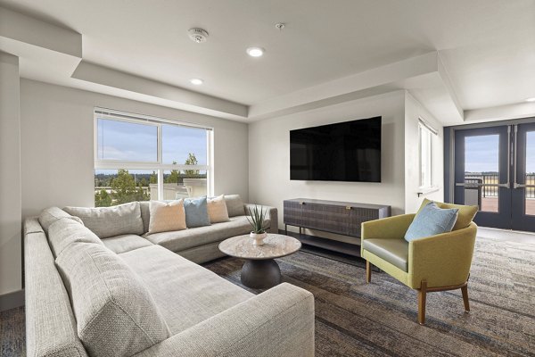 Intimate theater room with plush seating at Destinations Lynnwood Apartments, perfect for movie nights and entertainment