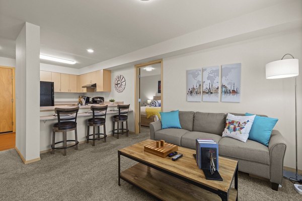 Spacious living room with contemporary furniture at Destinations Lynnwood Apartments