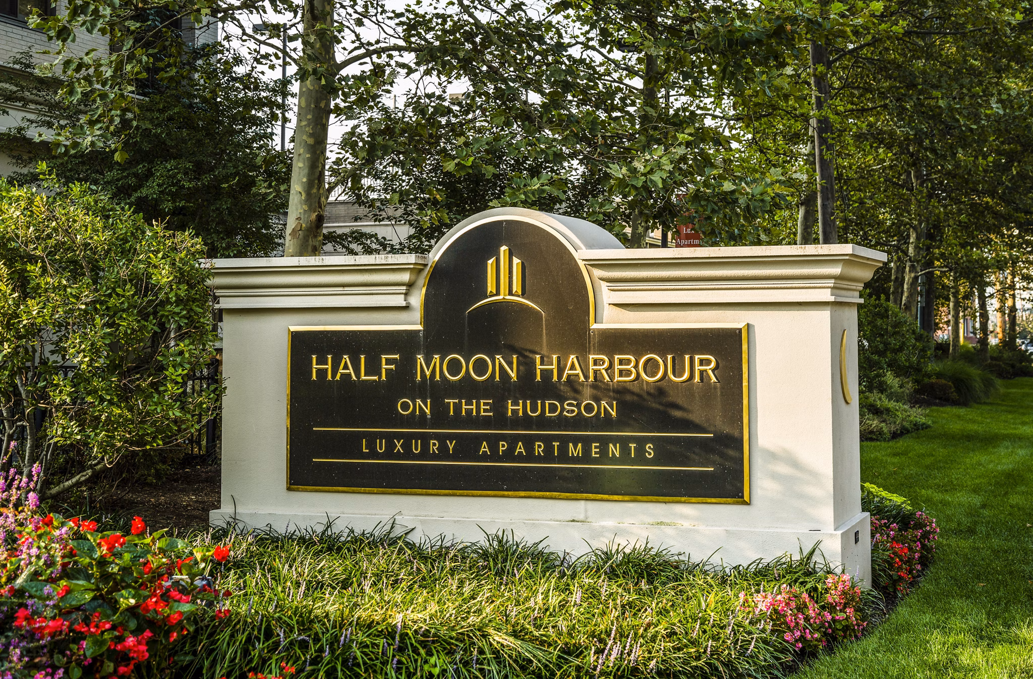 Half Moon Harbour on the Hudson luxury apartments sign at the entrance of the property
