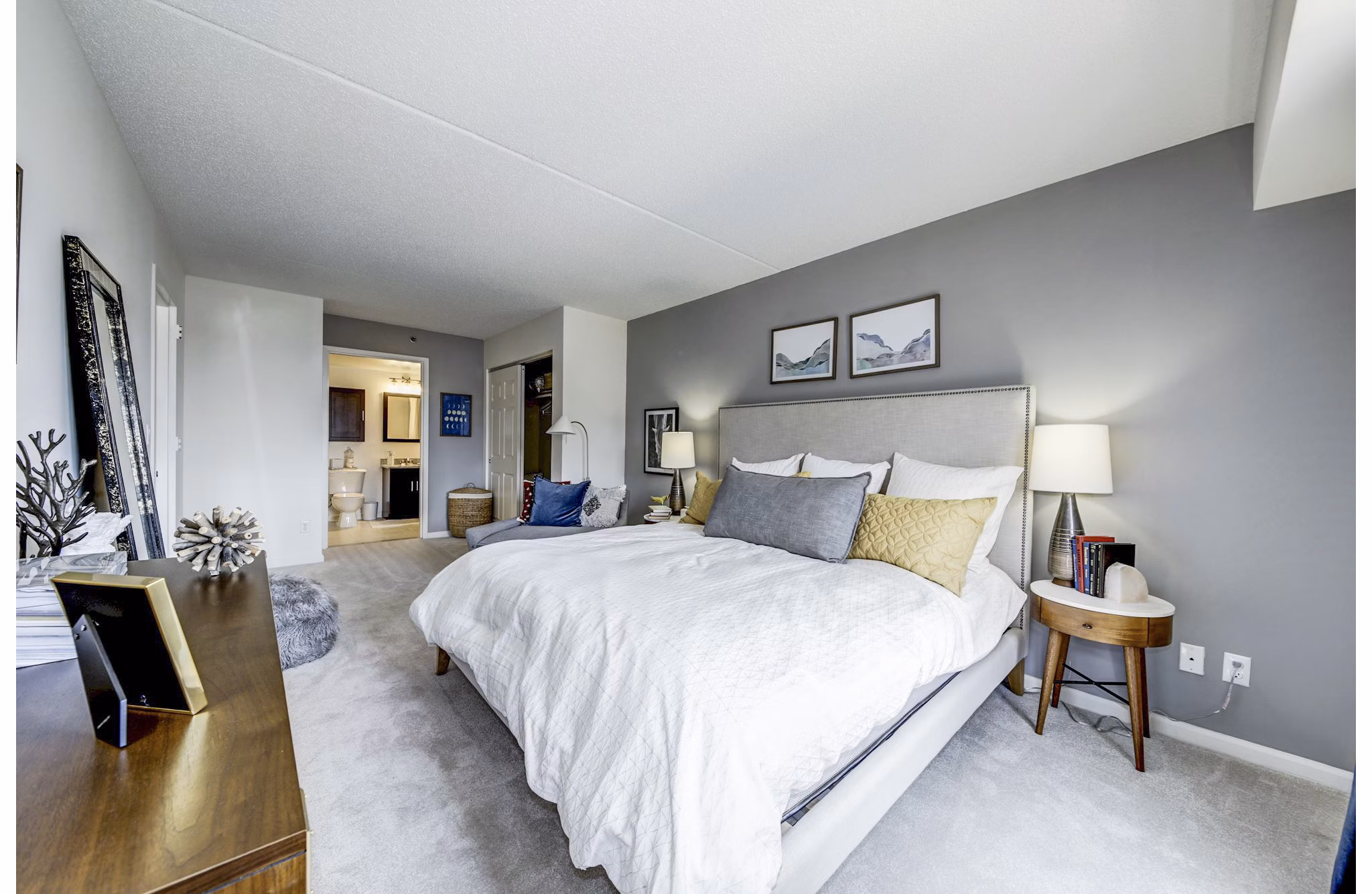 Inviting bedroom with serene views at Half Moon Harbour Apartments, offering luxury living by Greystar