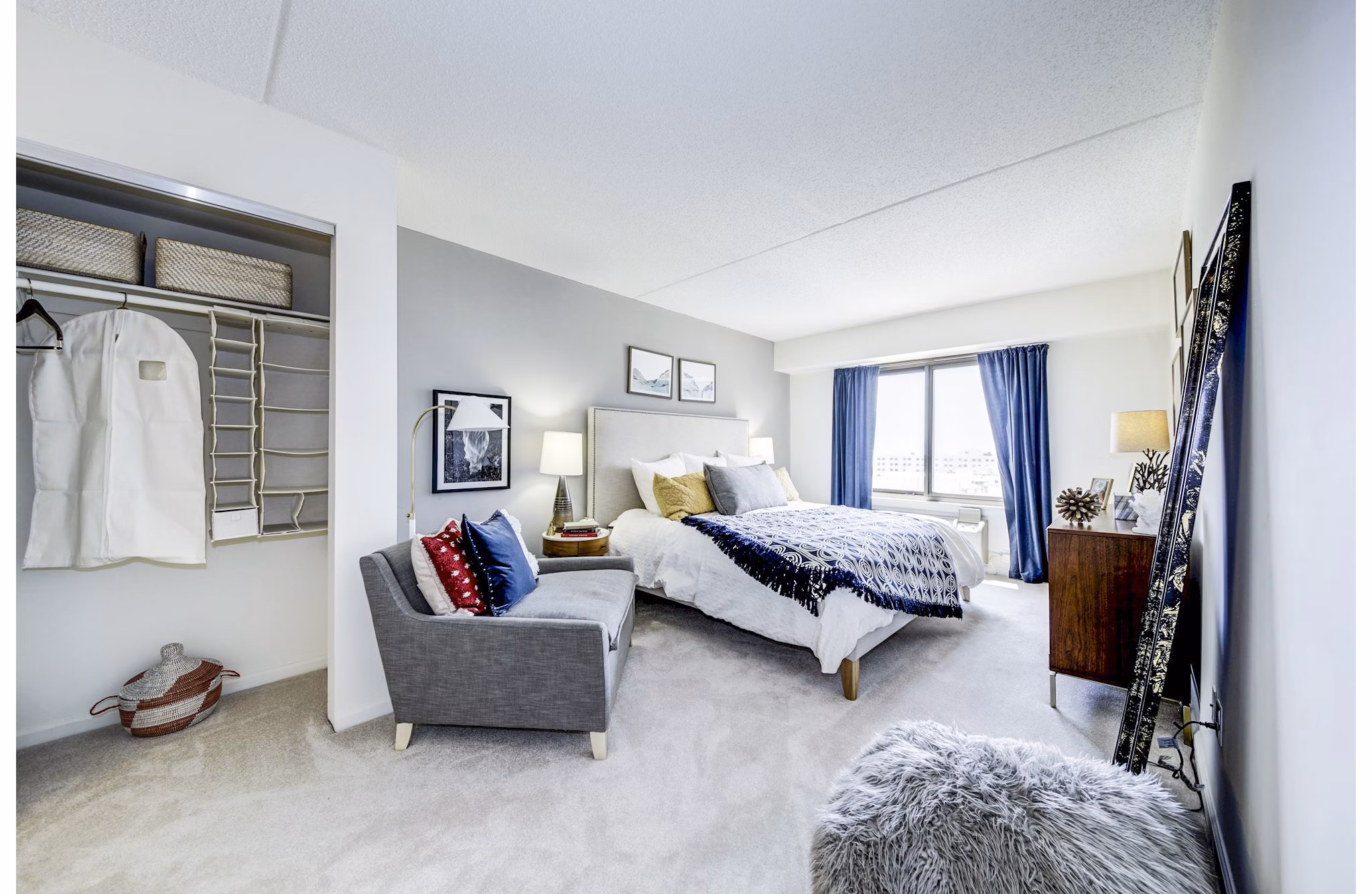 Bedroom with ocean view and modern decor in Half Moon Harbour Apartments