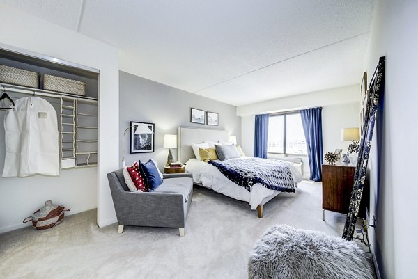 Bedroom with ocean view and modern decor in Half Moon Harbour Apartments