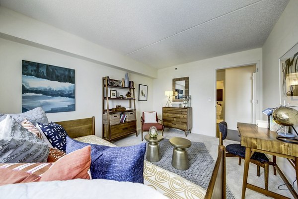 Bedroom with scenic waterfront view at Half Moon Harbour Apartments