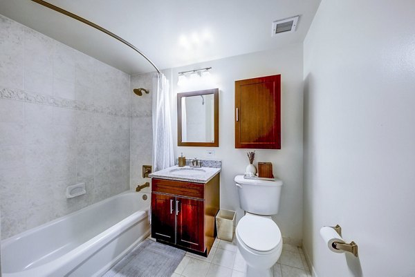 Luxurious bathroom with modern fixtures at Half Moon Harbour Apartments