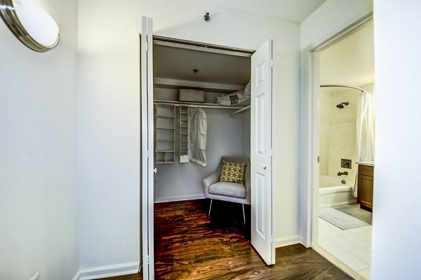 Walk-in closet with ample storage space at Half Moon Harbour Apartments