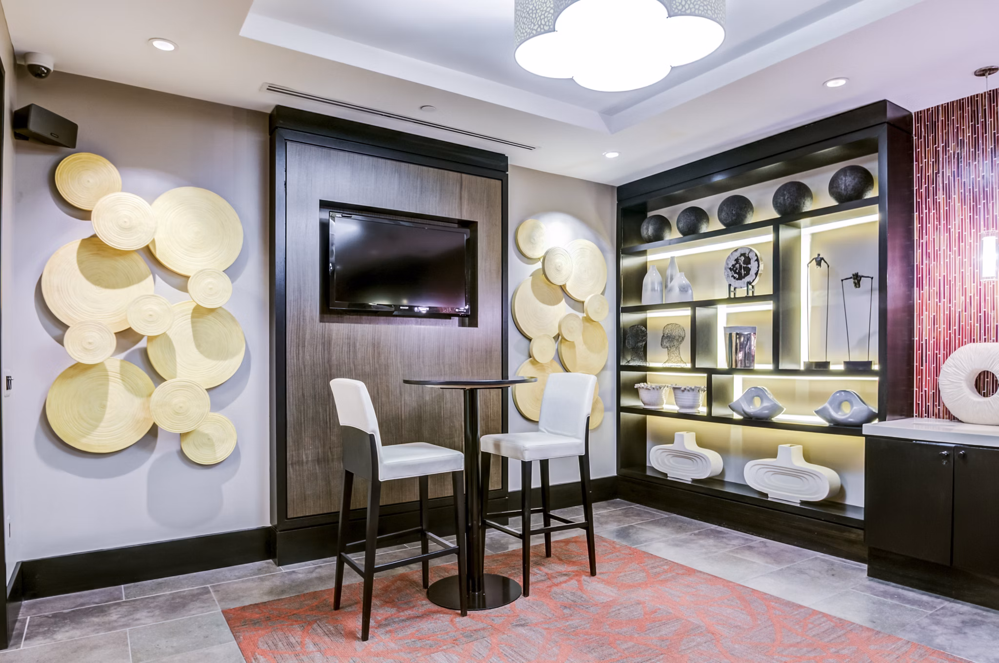 Elegant clubhouse lobby with modern decor at Half Moon Harbour Apartments, offering luxurious community spaces for residents