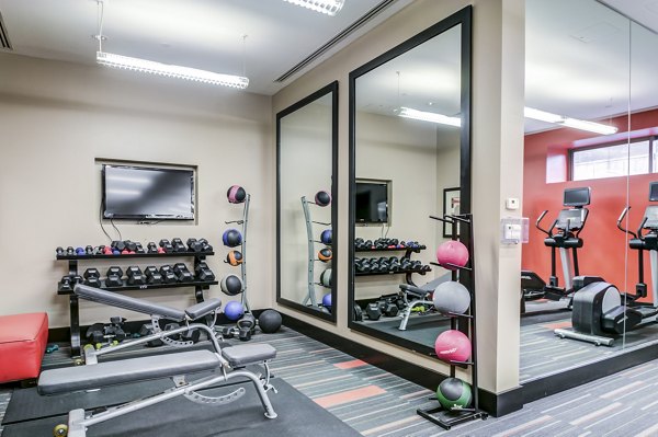 Fitness center with state-of-the-art equipment at Half Moon Harbour Apartments