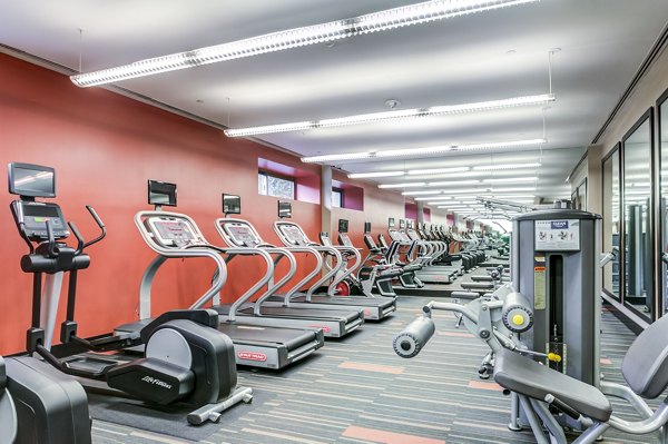 Modern fitness center with state-of-the-art equipment at Half Moon Harbour Apartments, perfect for maintaining an active lifestyle