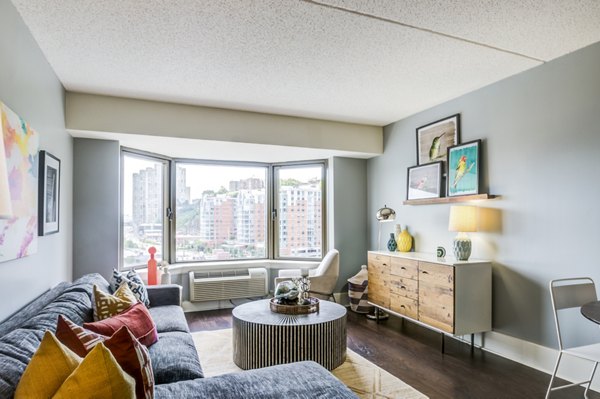 Spacious living room with modern decor in Half Moon Harbour Apartments