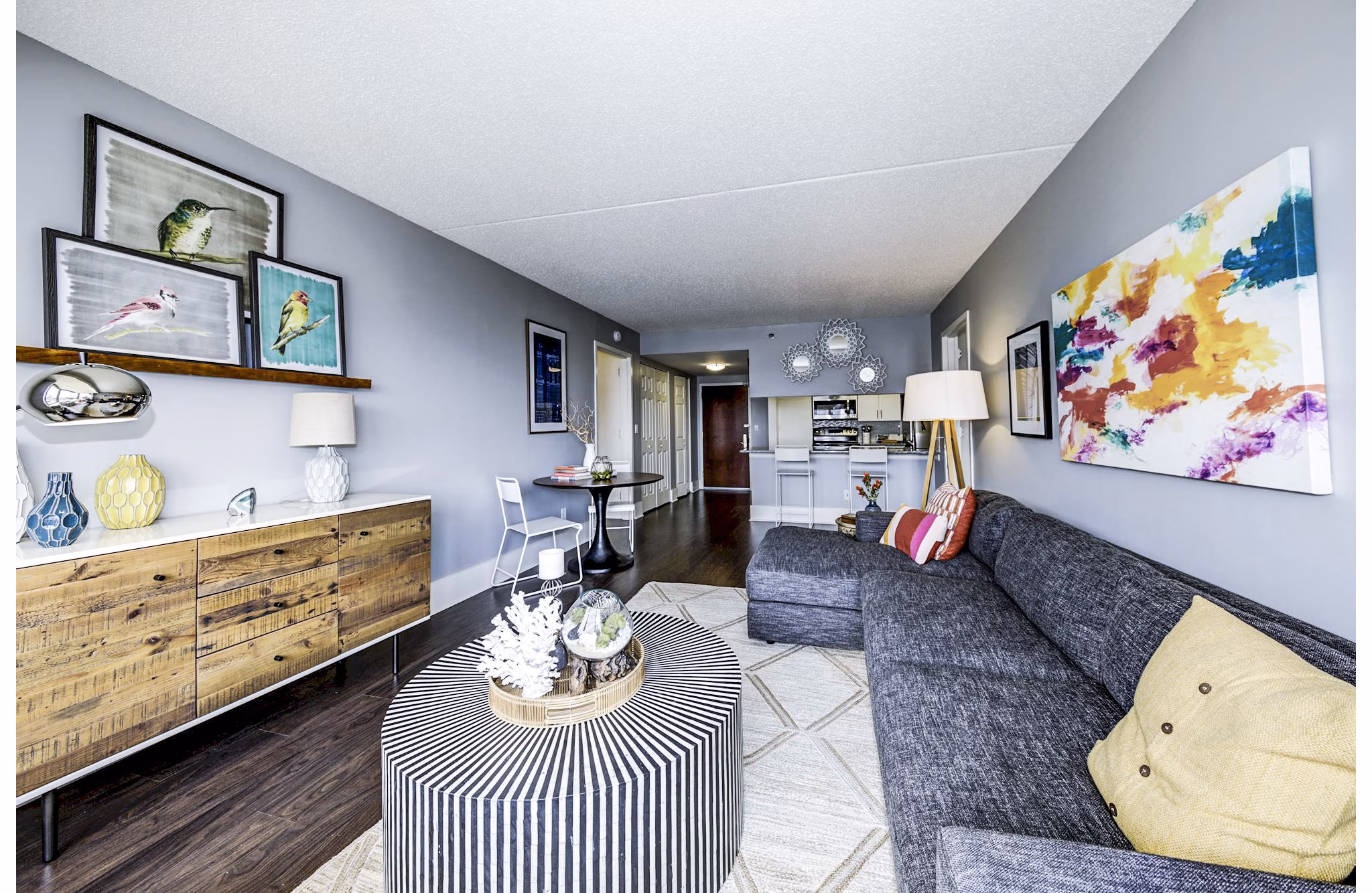 Spacious living room with modern decor in Half Moon Harbour Apartments