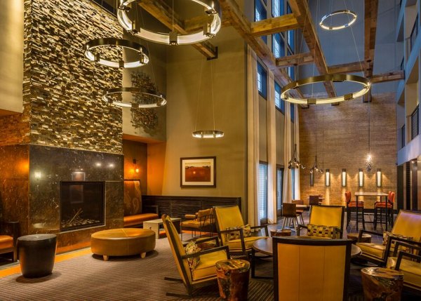Clubhouse featuring modern design and lounge seating at Mountain View Crossing luxury apartments