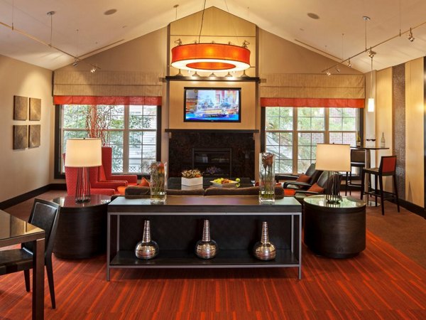 Modern clubhouse with cozy seating and fireplace at Mountain View Crossing luxury apartments