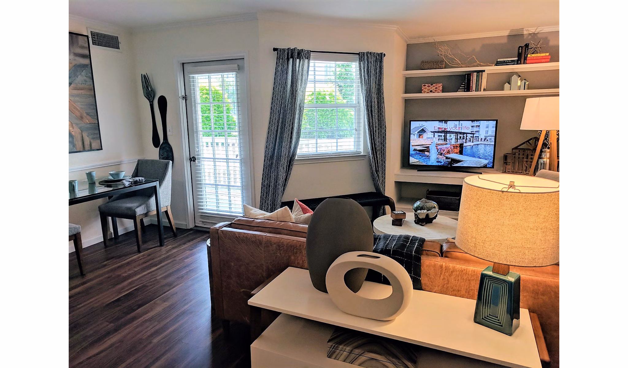 Elegant living room with modern decor and ample seating at Mountain View Crossing luxury apartments