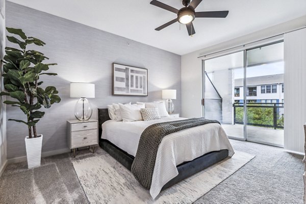 Cozy bedroom with modern furnishings at Broadstone on Trinity Apartments in luxury setting