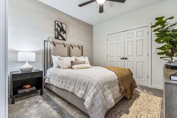 Spacious bedroom with modern decor at Broadstone on Trinity Apartments, featuring natural light and luxury finishes perfect for comfortable living