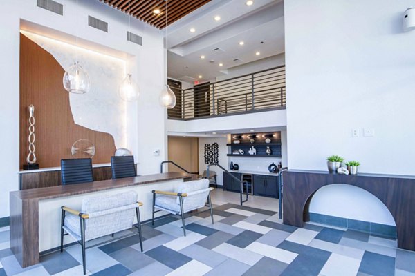 Clubhouse/lobby with modern decor and seating at Broadstone on Trinity Apartments
