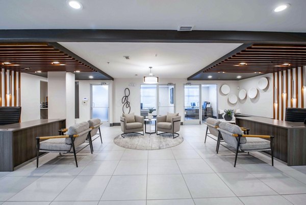 Elegant clubhouse lobby featuring modern seating at Broadstone on Trinity Apartments