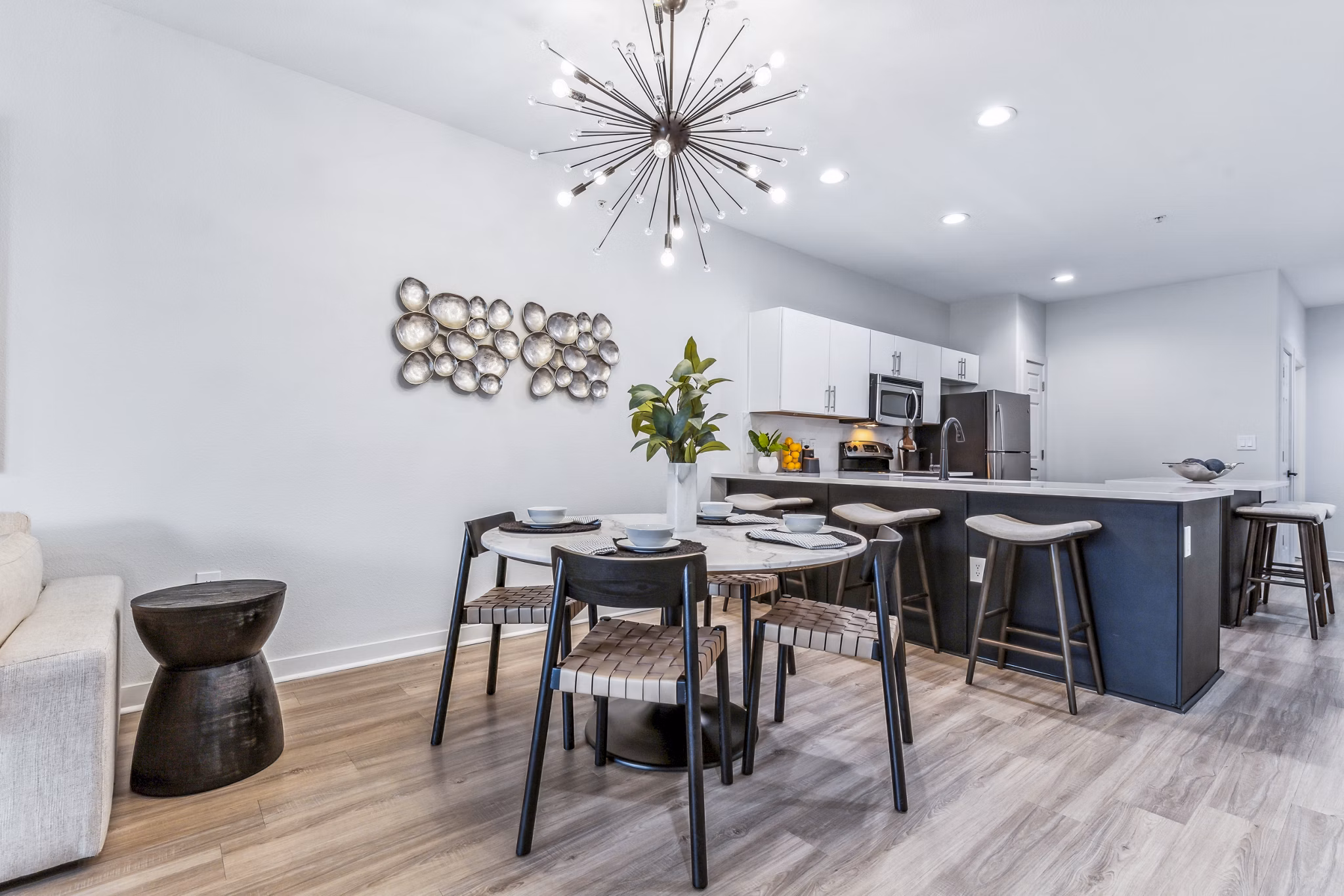 Elegant dining room with contemporary decor in Broadstone on Trinity Apartments, ideal for hosting guests and enjoying meals