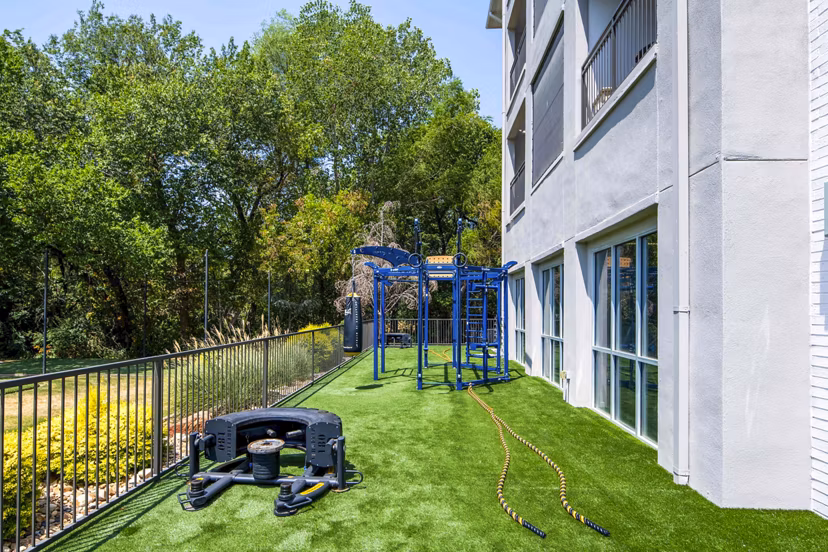 Outdoor fitness center equipped with modern exercise stations at Broadstone on Trinity Apartments, offering a healthy lifestyle option