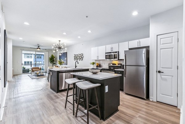 Modern kitchen featuring stainless steel appliances at Broadstone on Trinity Apartments