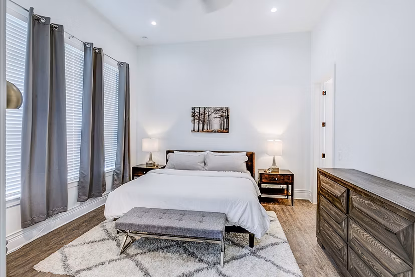 Bedroom with modern decor and natural light at Elan Inwood Apartments