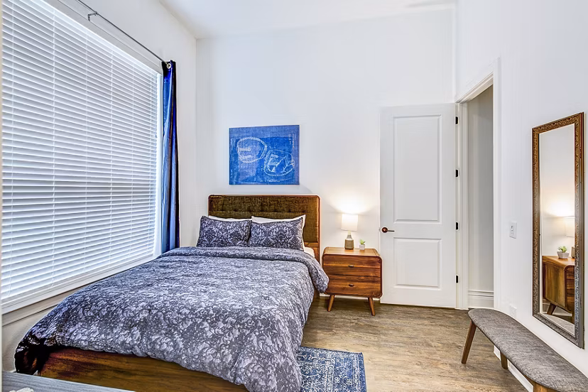 Cozy bedroom with modern furnishings at Elan Inwood Apartments, Greystar luxury apartments in a prime location
